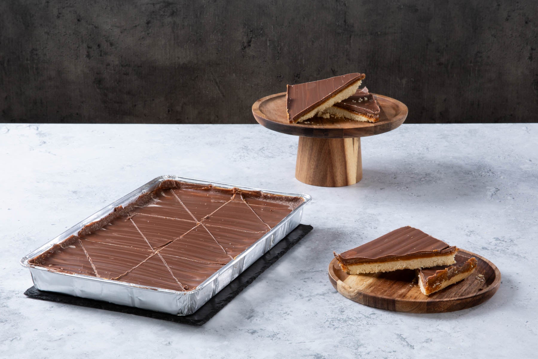 LHMC004-260.jpg Chocolate caramel shortbread traybake with sliced pieces.