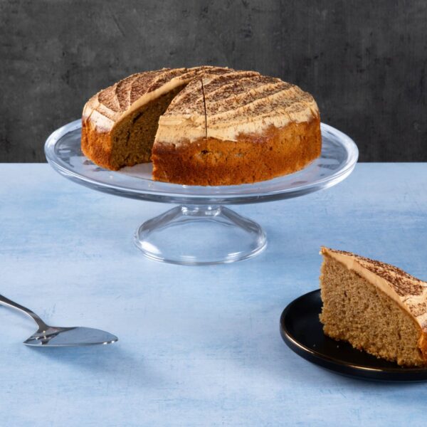 Chocolate caramel shortbread with chocolate topping on a wooden board.