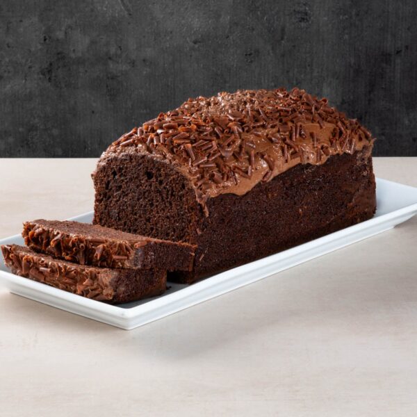 Chocolate loaf cake with chocolate icing and sliced pieces.