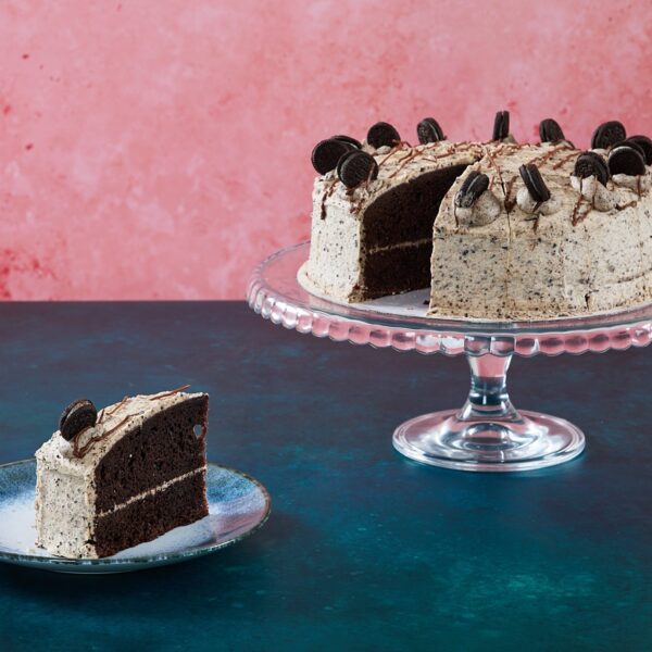 Cookies and cream cake with chocolate cookie pieces and cream frosting.