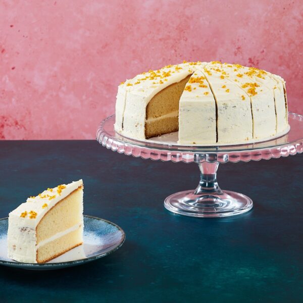 Persian-style lemon cake with lemon frosting and pistachios.